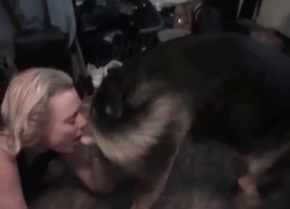 Blonde is sucking a huge doggy dick