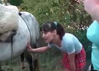 Two cute ladies and their horny stallion